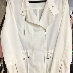 Calvin Klein sexy semi sheer off white jacket. Zippers and drawstring at waist.
